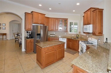 Enjoy breathtaking sunsets overlooking the 18th fairway from on The Club At Pointe West in Florida - for sale on GolfHomes.com, golf home, golf lot