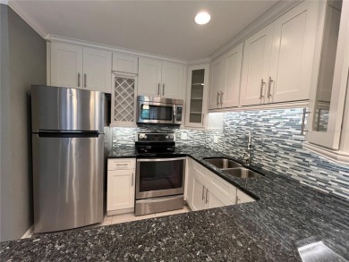 Golf Course Viewe see this fully updated condo in this highly on On Top Of The World Golf Course in Florida - for sale on GolfHomes.com, golf home, golf lot
