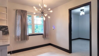 Single-story brick home built in 1954, offering approximately 2 on Willow Creek Country Club in Oklahoma - for sale on GolfHomes.com, golf home, golf lot