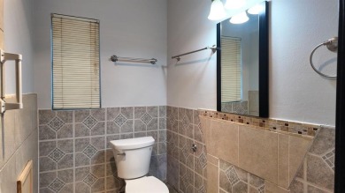 Single-story brick home built in 1954, offering approximately 2 on Willow Creek Country Club in Oklahoma - for sale on GolfHomes.com, golf home, golf lot