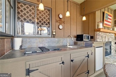This unique 3 BR / 2 BATH villa sits directly on the edge of on Big Canoe Golf Club - Cherokee in Georgia - for sale on GolfHomes.com, golf home, golf lot