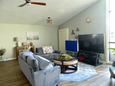 This 26x48 1984 Ventura home is located on a coveted corner lot on Grasslands Golf and Country Club in Florida - for sale on GolfHomes.com, golf home, golf lot