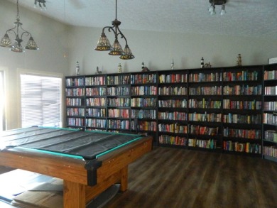 This 26x48 1984 Ventura home is located on a coveted corner lot on Grasslands Golf and Country Club in Florida - for sale on GolfHomes.com, golf home, golf lot