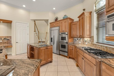 Stunning custom home in Kelly Plantation! This spacious on Kelly Plantation Golf Club in Florida - for sale on GolfHomes.com, golf home, golf lot