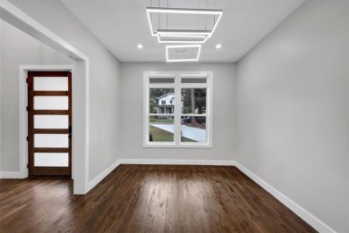 Step into flawless modern luxury at this brand-new custom-built on East Lake Golf Club in Georgia - for sale on GolfHomes.com, golf home, golf lot