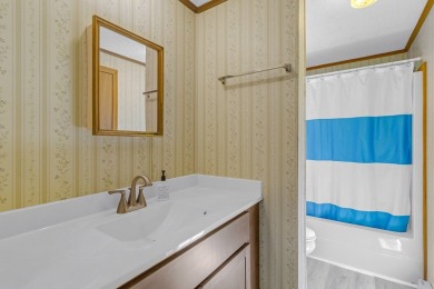 Welcome to this charming 3-bedroom, 2-bath home located next to on Piankatank River Golf Club in Virginia - for sale on GolfHomes.com, golf home, golf lot