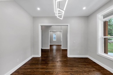 Step into flawless modern luxury at this brand-new custom-built on East Lake Golf Club in Georgia - for sale on GolfHomes.com, golf home, golf lot