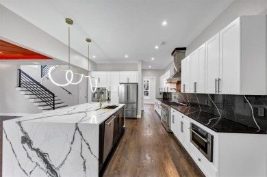 Step into flawless modern luxury at this brand-new custom-built on East Lake Golf Club in Georgia - for sale on GolfHomes.com, golf home, golf lot