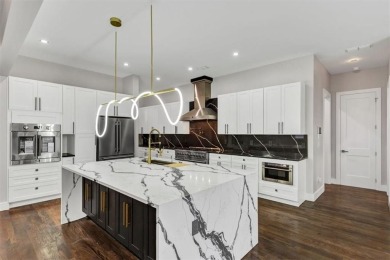 Step into flawless modern luxury at this brand-new custom-built on East Lake Golf Club in Georgia - for sale on GolfHomes.com, golf home, golf lot