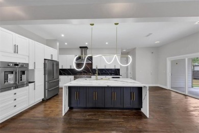 Step into flawless modern luxury at this brand-new custom-built on East Lake Golf Club in Georgia - for sale on GolfHomes.com, golf home, golf lot