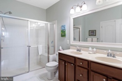 Welcome to this stunning 4-bedroom, 2.5-bathroom end unit on Plantation Lakes Golf and Country Club in Delaware - for sale on GolfHomes.com, golf home, golf lot