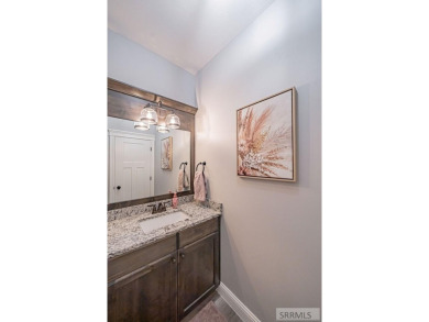 Stunning home nestled in a quiet, secluded neighborhood right on Idaho Falls Country Club in Idaho - for sale on GolfHomes.com, golf home, golf lot