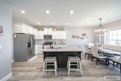 Stunning home nestled in a quiet, secluded neighborhood right on Idaho Falls Country Club in Idaho - for sale on GolfHomes.com, golf home, golf lot
