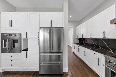 Step into flawless modern luxury at this brand-new custom-built on East Lake Golf Club in Georgia - for sale on GolfHomes.com, golf home, golf lot