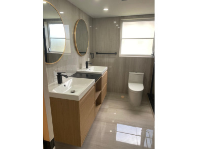 Fully remodeled corner 3BR/2BA condo bathed in natural light on Palm-Aire Country Club and Resort - The Oaks in Florida - for sale on GolfHomes.com, golf home, golf lot