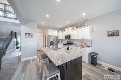 Stunning home nestled in a quiet, secluded neighborhood right on Idaho Falls Country Club in Idaho - for sale on GolfHomes.com, golf home, golf lot