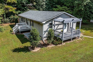 Welcome to this charming 3-bedroom, 2-bath home located next to on Piankatank River Golf Club in Virginia - for sale on GolfHomes.com, golf home, golf lot