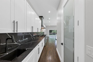 Step into flawless modern luxury at this brand-new custom-built on East Lake Golf Club in Georgia - for sale on GolfHomes.com, golf home, golf lot