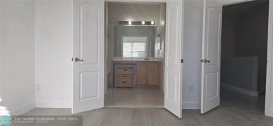 Stunning & spacious 3 bedroom 2.5-bathroom townhouse with on The Carolina Club in Florida - for sale on GolfHomes.com, golf home, golf lot