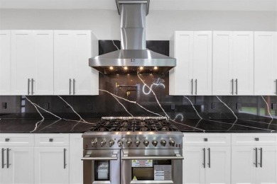 Step into flawless modern luxury at this brand-new custom-built on East Lake Golf Club in Georgia - for sale on GolfHomes.com, golf home, golf lot
