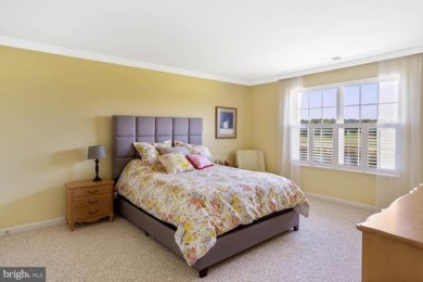 Welcome to this stunning 4-bedroom, 2.5-bathroom end unit on Plantation Lakes Golf and Country Club in Delaware - for sale on GolfHomes.com, golf home, golf lot