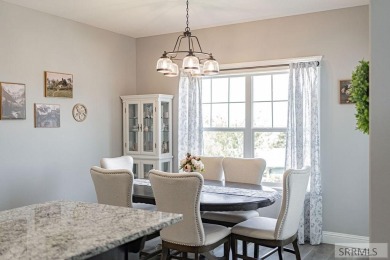 Stunning home nestled in a quiet, secluded neighborhood right on Idaho Falls Country Club in Idaho - for sale on GolfHomes.com, golf home, golf lot