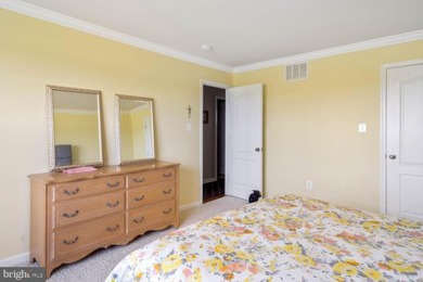Welcome to this stunning 4-bedroom, 2.5-bathroom end unit on Plantation Lakes Golf and Country Club in Delaware - for sale on GolfHomes.com, golf home, golf lot