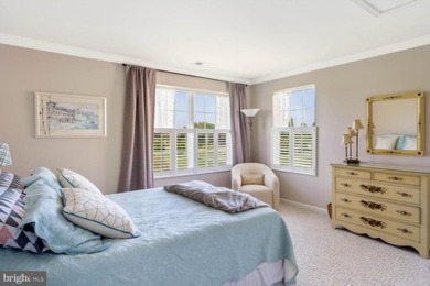 Welcome to this stunning 4-bedroom, 2.5-bathroom end unit on Plantation Lakes Golf and Country Club in Delaware - for sale on GolfHomes.com, golf home, golf lot