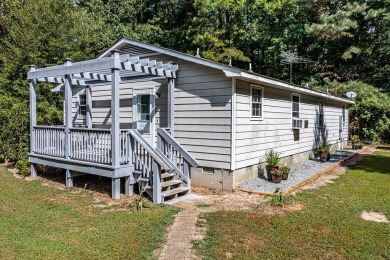 Welcome to this charming 3-bedroom, 2-bath home located next to on Piankatank River Golf Club in Virginia - for sale on GolfHomes.com, golf home, golf lot