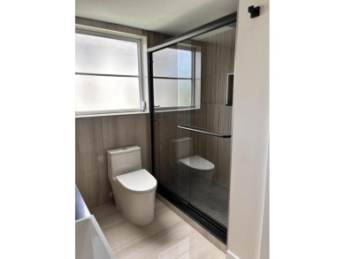 Fully remodeled corner 3BR/2BA condo bathed in natural light on Palm-Aire Country Club and Resort - The Oaks in Florida - for sale on GolfHomes.com, golf home, golf lot