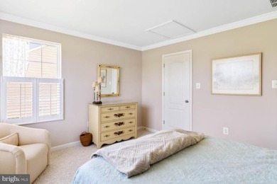 Welcome to this stunning 4-bedroom, 2.5-bathroom end unit on Plantation Lakes Golf and Country Club in Delaware - for sale on GolfHomes.com, golf home, golf lot