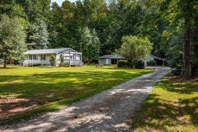 Welcome to this charming 3-bedroom, 2-bath home located next to on Piankatank River Golf Club in Virginia - for sale on GolfHomes.com, golf home, golf lot