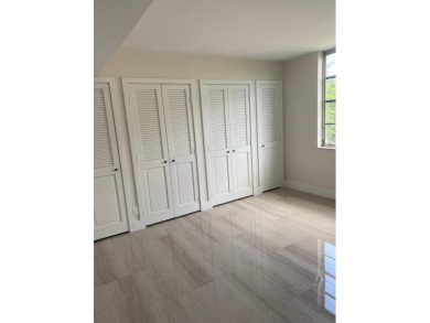 Fully remodeled corner 3BR/2BA condo bathed in natural light on Palm-Aire Country Club and Resort - The Oaks in Florida - for sale on GolfHomes.com, golf home, golf lot