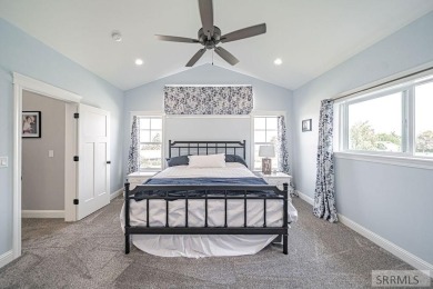 Stunning home nestled in a quiet, secluded neighborhood right on Idaho Falls Country Club in Idaho - for sale on GolfHomes.com, golf home, golf lot