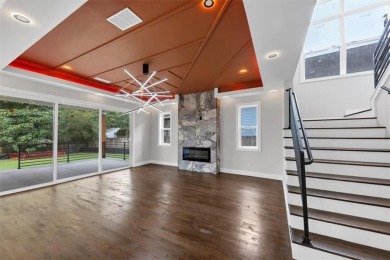 Step into flawless modern luxury at this brand-new custom-built on East Lake Golf Club in Georgia - for sale on GolfHomes.com, golf home, golf lot