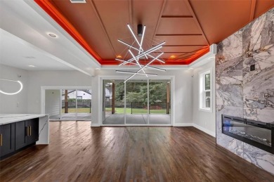 Step into flawless modern luxury at this brand-new custom-built on East Lake Golf Club in Georgia - for sale on GolfHomes.com, golf home, golf lot