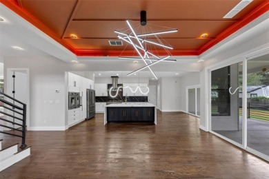 Step into flawless modern luxury at this brand-new custom-built on East Lake Golf Club in Georgia - for sale on GolfHomes.com, golf home, golf lot