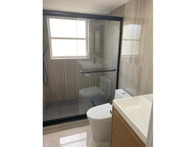 Fully remodeled corner 3BR/2BA condo bathed in natural light on Palm-Aire Country Club and Resort - The Oaks in Florida - for sale on GolfHomes.com, golf home, golf lot