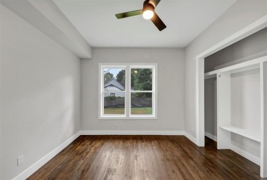 Step into flawless modern luxury at this brand-new custom-built on East Lake Golf Club in Georgia - for sale on GolfHomes.com, golf home, golf lot