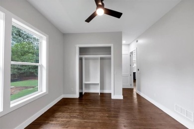 Step into flawless modern luxury at this brand-new custom-built on East Lake Golf Club in Georgia - for sale on GolfHomes.com, golf home, golf lot