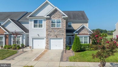 Welcome to this stunning 4-bedroom, 2.5-bathroom end unit on Plantation Lakes Golf and Country Club in Delaware - for sale on GolfHomes.com, golf home, golf lot