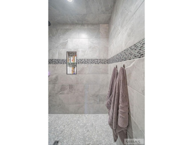 Stunning home nestled in a quiet, secluded neighborhood right on Idaho Falls Country Club in Idaho - for sale on GolfHomes.com, golf home, golf lot