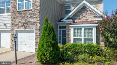 Welcome to this stunning 4-bedroom, 2.5-bathroom end unit on Plantation Lakes Golf and Country Club in Delaware - for sale on GolfHomes.com, golf home, golf lot