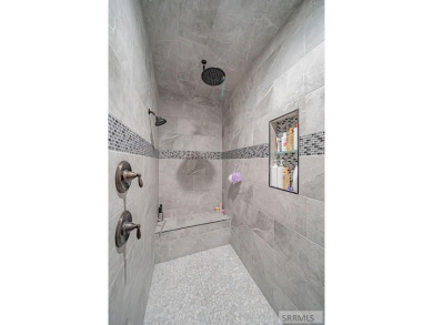 Stunning home nestled in a quiet, secluded neighborhood right on Idaho Falls Country Club in Idaho - for sale on GolfHomes.com, golf home, golf lot