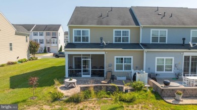 Welcome to this stunning 4-bedroom, 2.5-bathroom end unit on Plantation Lakes Golf and Country Club in Delaware - for sale on GolfHomes.com, golf home, golf lot