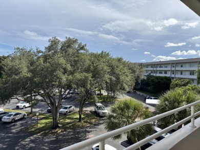 Fully remodeled corner 3BR/2BA condo bathed in natural light on Palm-Aire Country Club and Resort - The Oaks in Florida - for sale on GolfHomes.com, golf home, golf lot