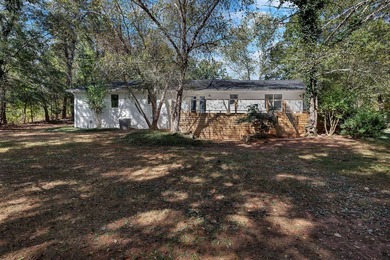 Welcome to this beautiful 3-bedroom, 2-bath brick home located on Stone Creek Cove Golf Course in South Carolina - for sale on GolfHomes.com, golf home, golf lot