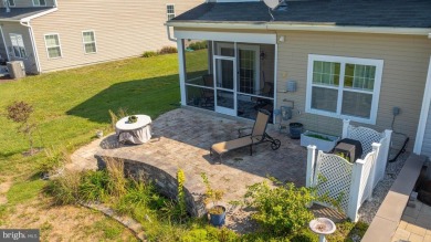 Welcome to this stunning 4-bedroom, 2.5-bathroom end unit on Plantation Lakes Golf and Country Club in Delaware - for sale on GolfHomes.com, golf home, golf lot