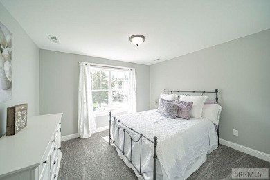 Stunning home nestled in a quiet, secluded neighborhood right on Idaho Falls Country Club in Idaho - for sale on GolfHomes.com, golf home, golf lot