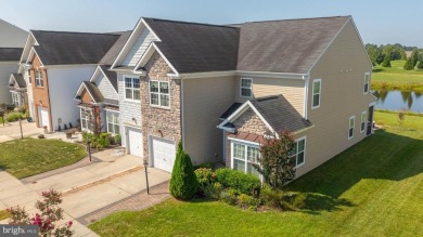 Welcome to this stunning 4-bedroom, 2.5-bathroom end unit on Plantation Lakes Golf and Country Club in Delaware - for sale on GolfHomes.com, golf home, golf lot